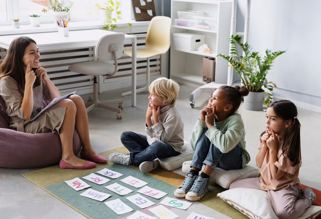 The teacher is teaching three children.