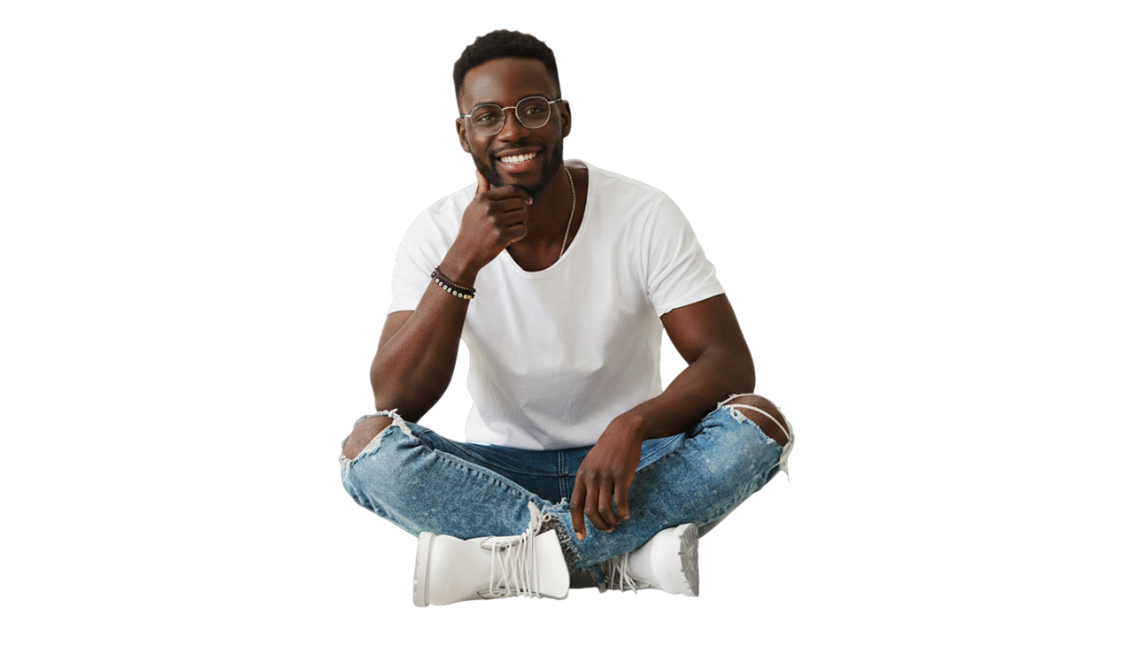 Smiling child sitting comfortably in a studio setting